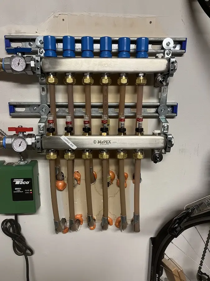 Plumber performing Water Heater Repair at a residential property in McGehee